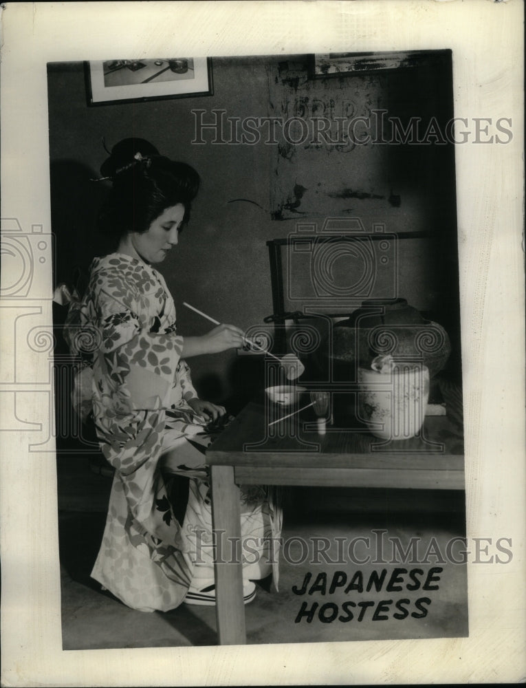 Press Photo Japanese hostess pouring soup - RRU27319 - Historic Images