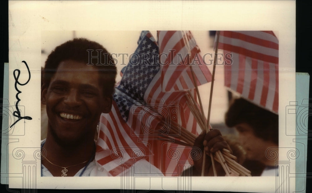 1984, Kenny Hunter Selling Flags Dollar Cobo - RRU31691 - Historic Images