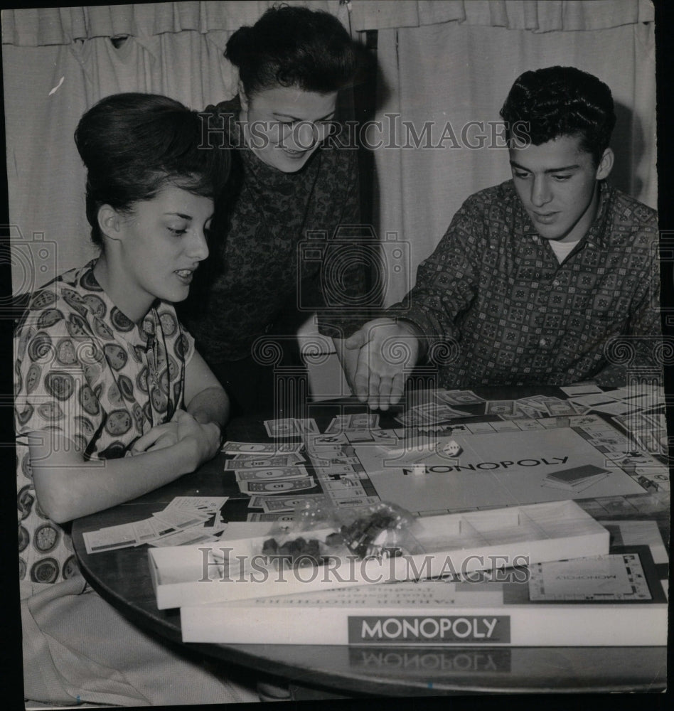 1962 Monopoly Game Family Playing - Historic Images