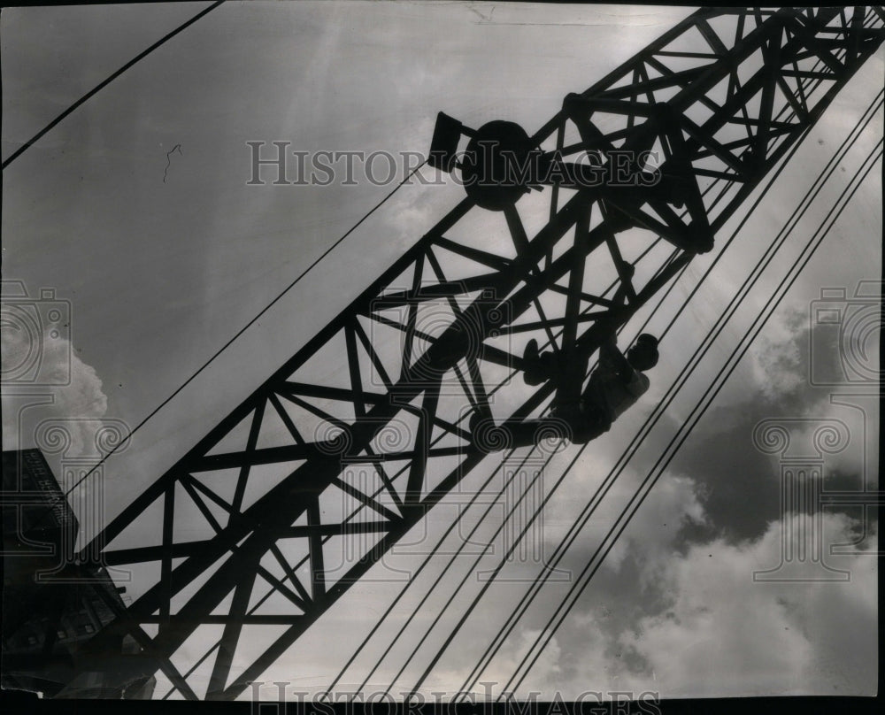 The Mercury Climbs and to does Ricard Ward a crane oil - Historic Images
