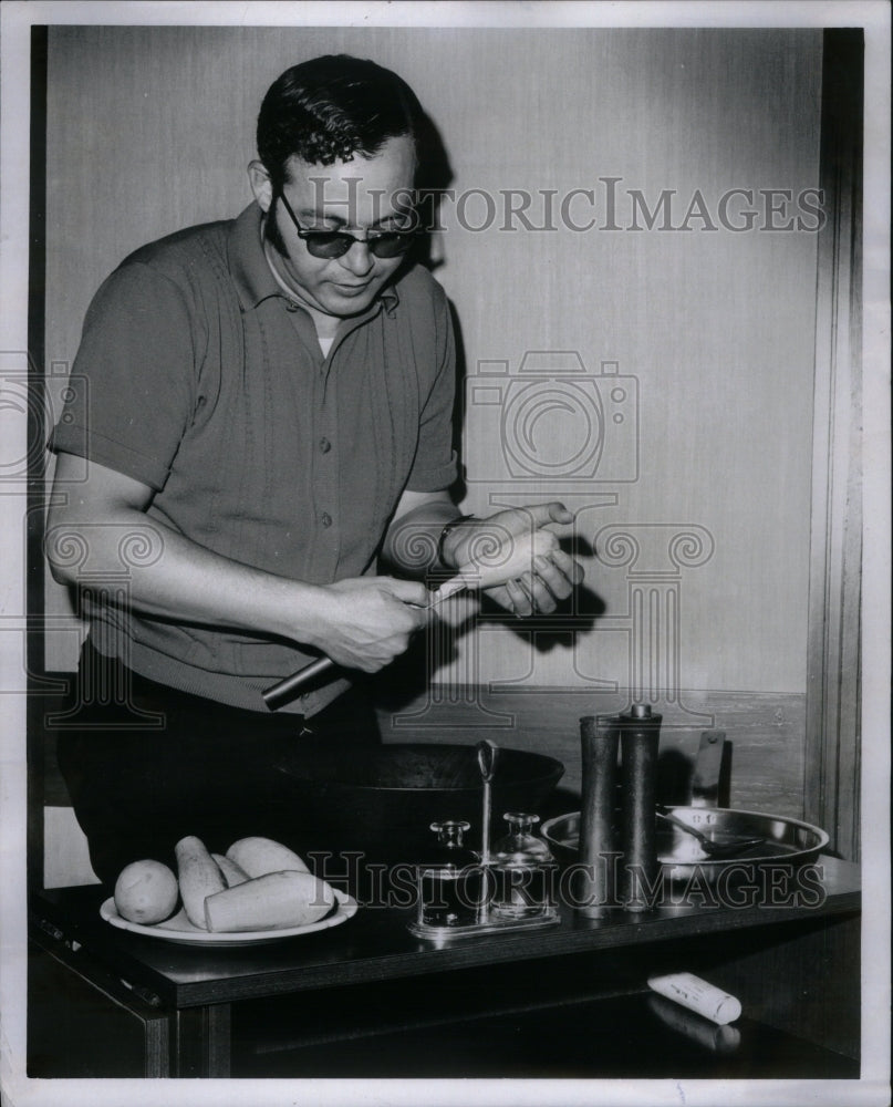 1970, Ahmad Tousis Cook Balancer Flame - RRU37425 - Historic Images