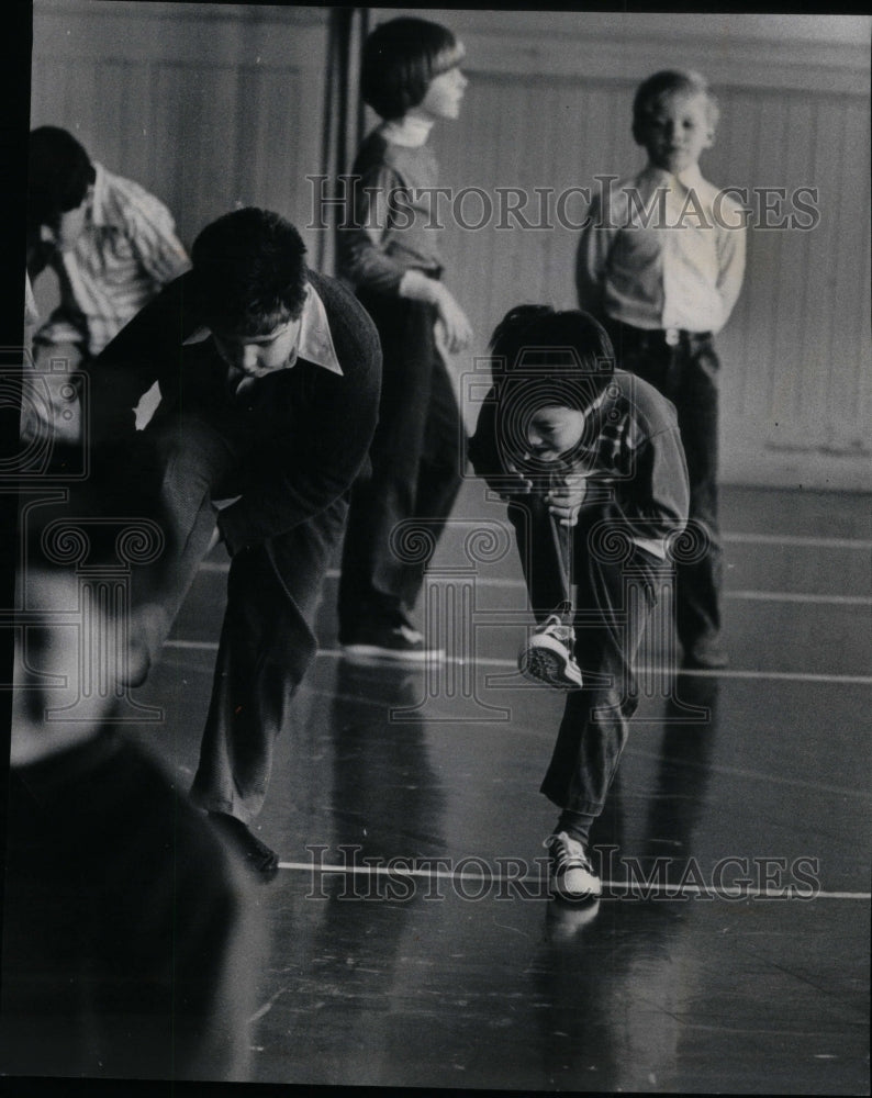 1972, Class Student Fun Game Exercise Knee - RRU38421 - Historic Images