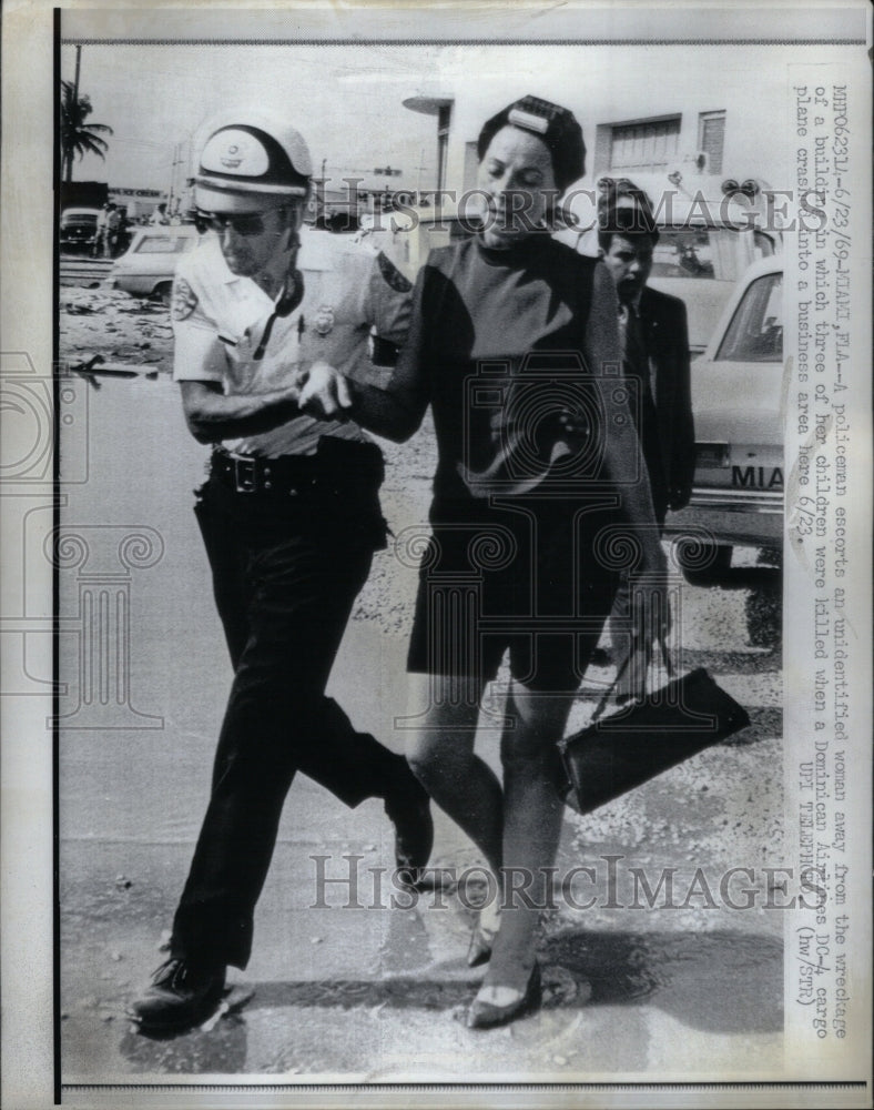 1969, Policemen Woman Dominican Airlines - RRU39155 - Historic Images