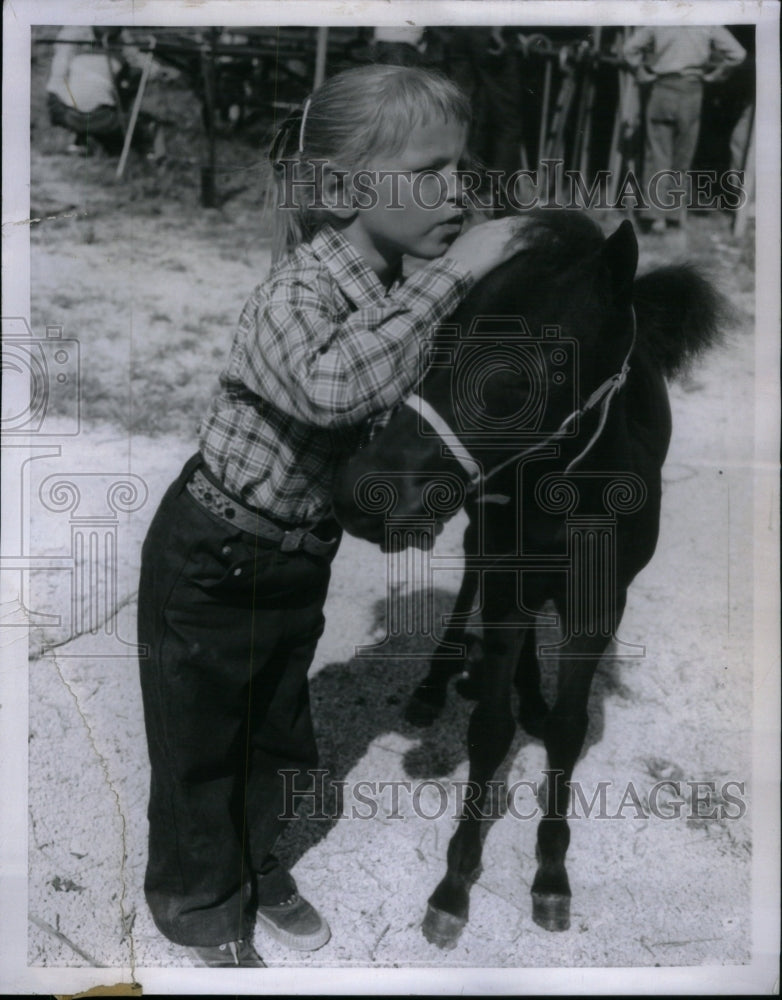 1957, Shirley Miller poses pony - RRU41989 - Historic Images