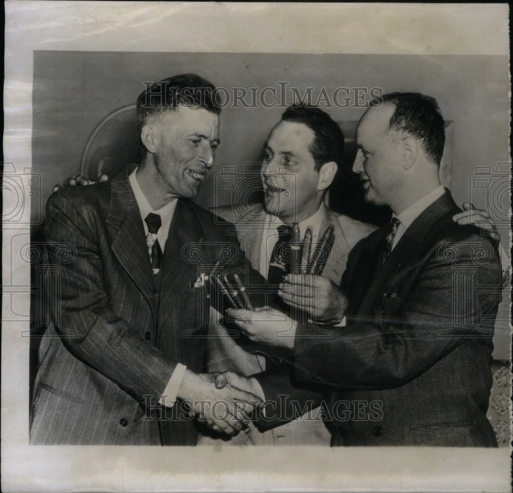 1952, Man With Friends Celebrating Quads - RRU43783 - Historic Images