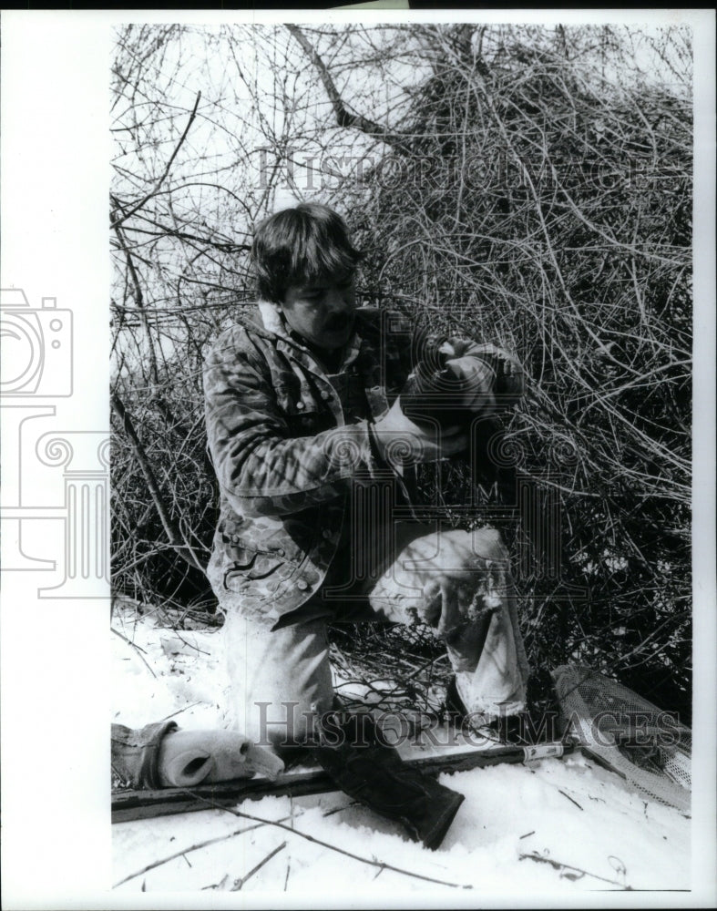 1988, Brad Johnson with a pheasant - RRU44485 - Historic Images