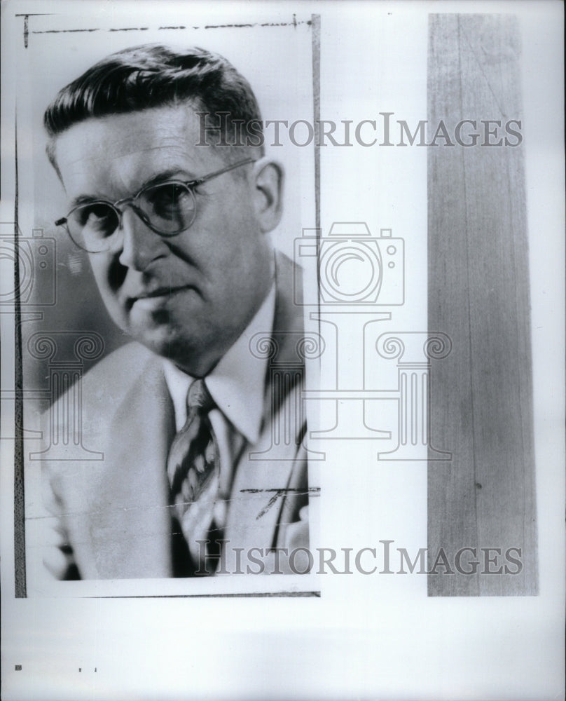 Man wears suit new spectacles photo pose - Historic Images