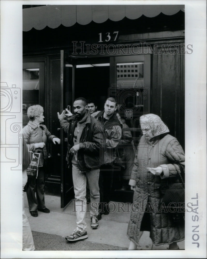 1992 Employees evacuate Marshall Fields - Historic Images