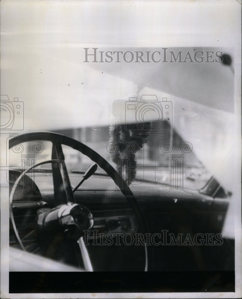 1963 Press Photo Objects Hanging From Rearview Mirror - Historic Images