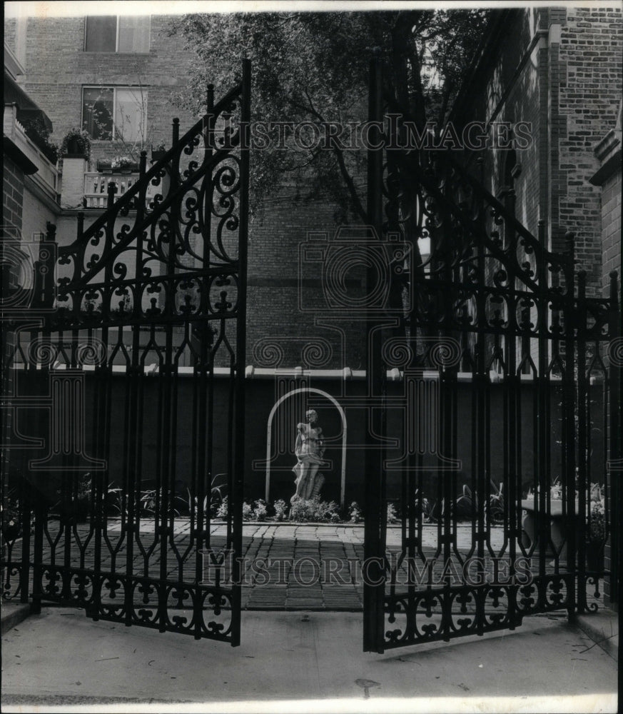 1966, Iron gates and formal brick courtyard - RRU50655 - Historic Images