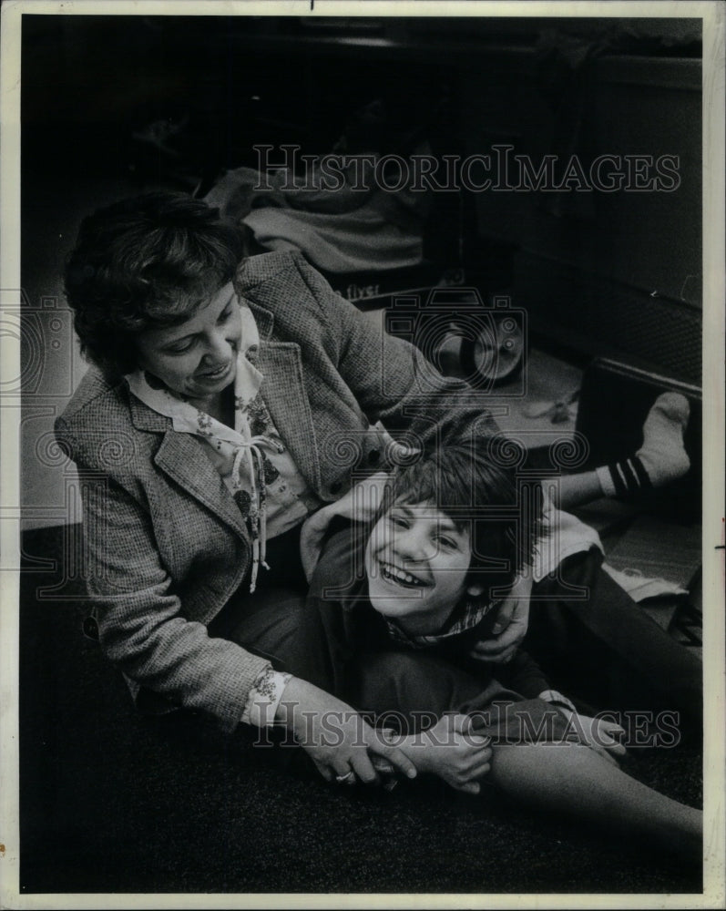 1983, Physical therapist Debra Parvin Child - RRU50997 - Historic Images