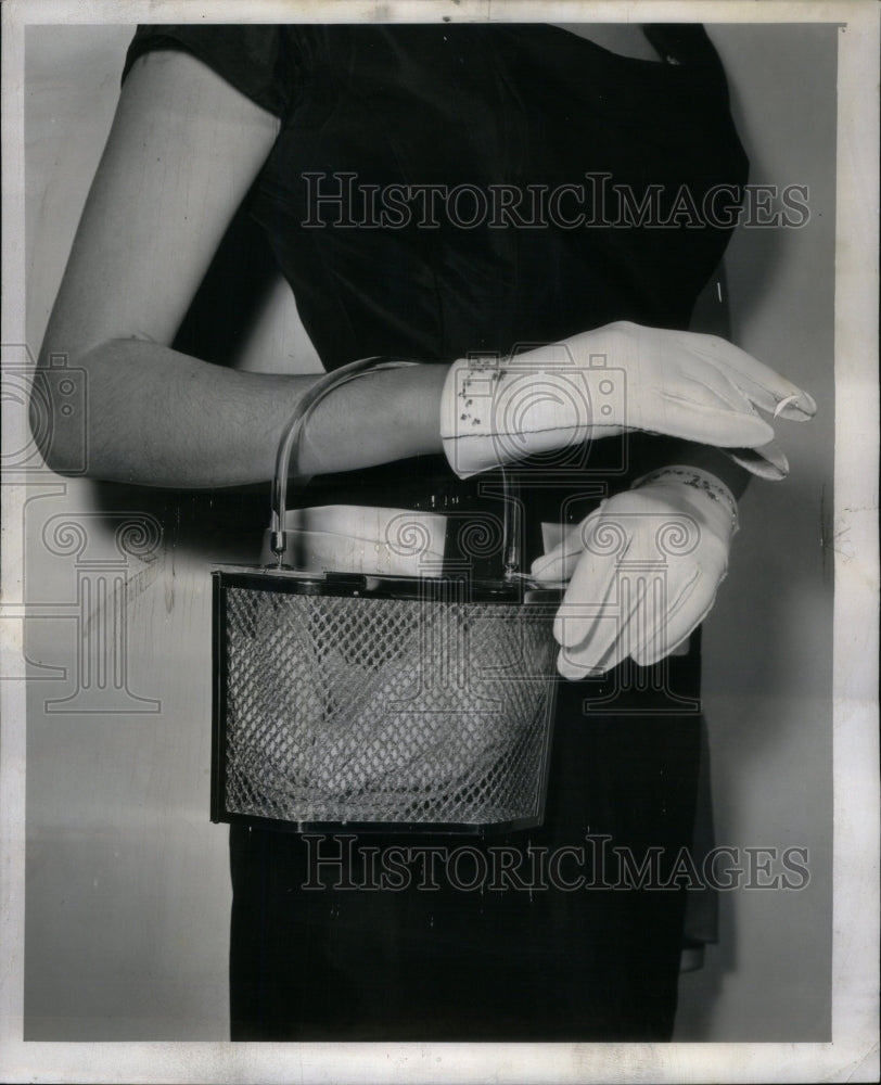 1956 Press Photo Vinylite bags gold mesh pattren white - RRU51081 - Historic Images