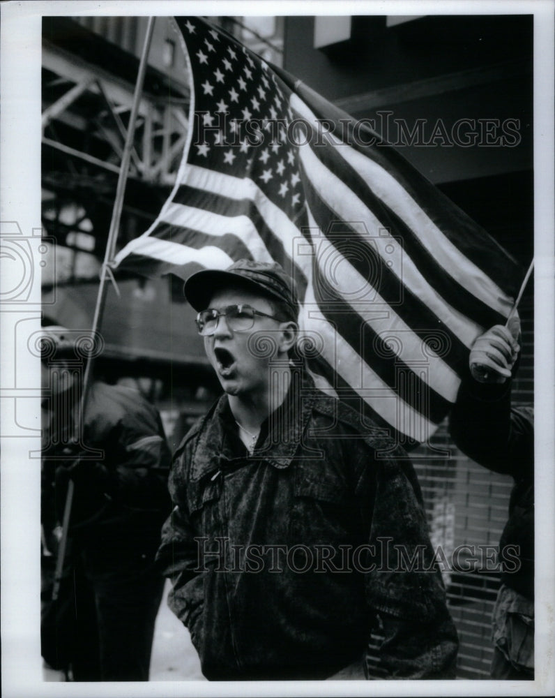 1991, Counter John Schultz Flag American - RRU53933 - Historic Images