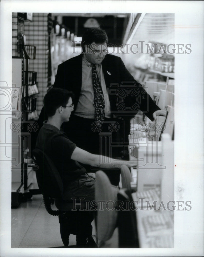 1994, Manager Showing Computer To Customer - RRU58285 - Historic Images