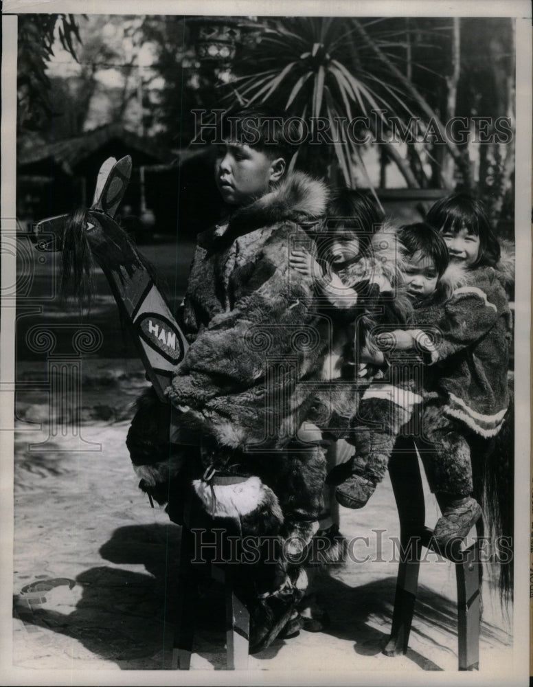  Eskimo children observating white man&#39;s - Historic Images