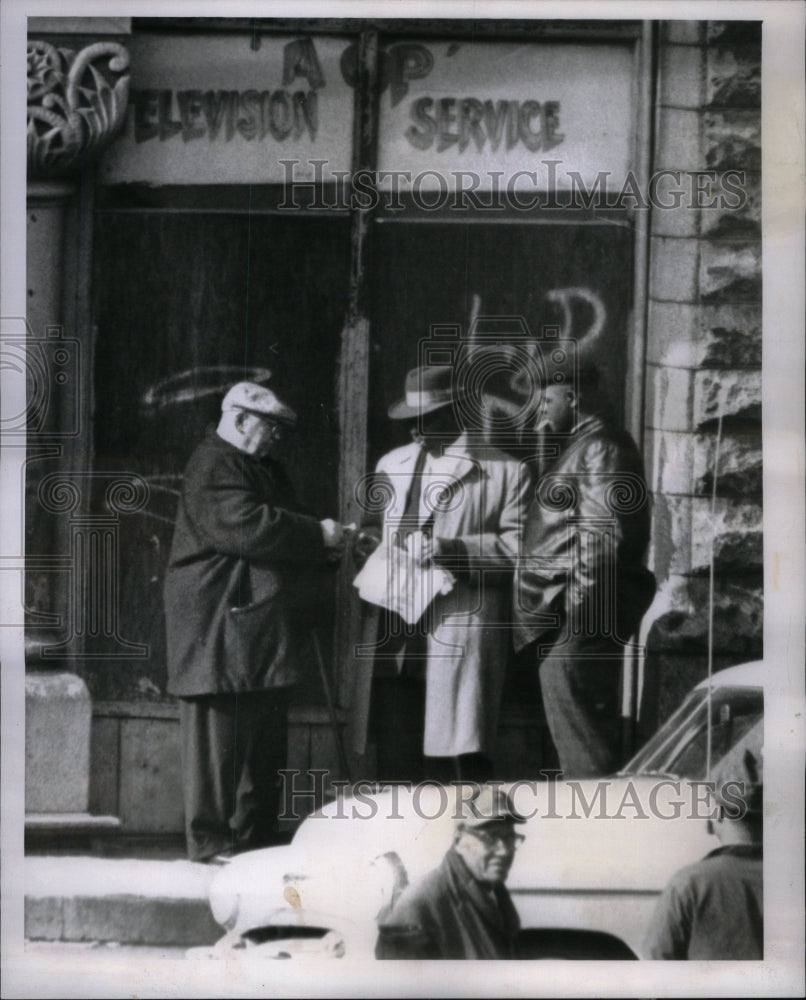 1962 Mackenberg giving money for vote - Historic Images