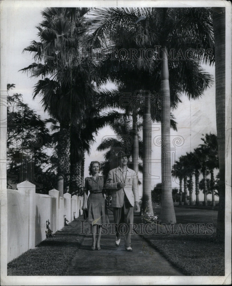 1941 Couple walking road Tree Wall - Historic Images