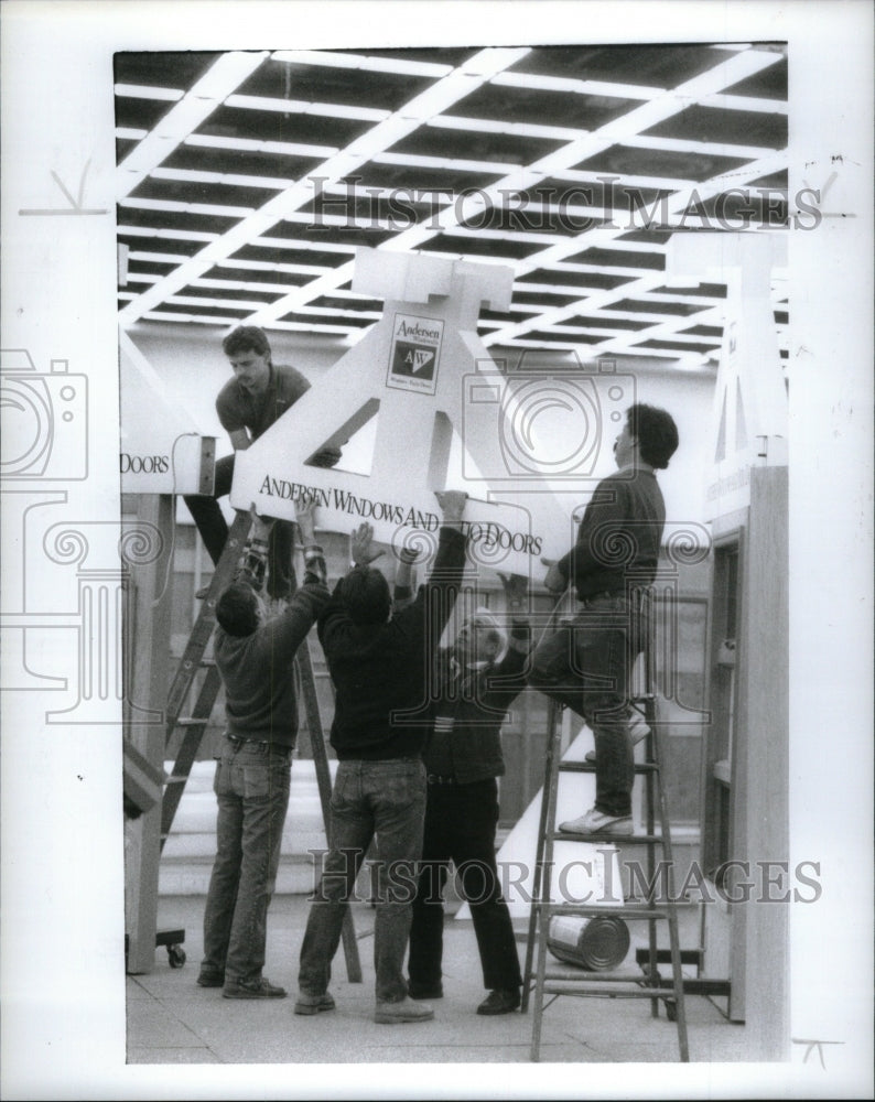 1989, Workers Anderson Windows display show - RRU60765 - Historic Images