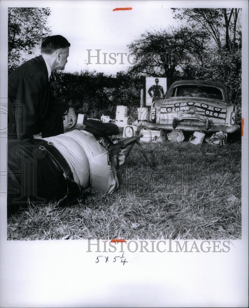 1961, Person Machine Gun Hand Aims Target - RRU60869 - Historic Images