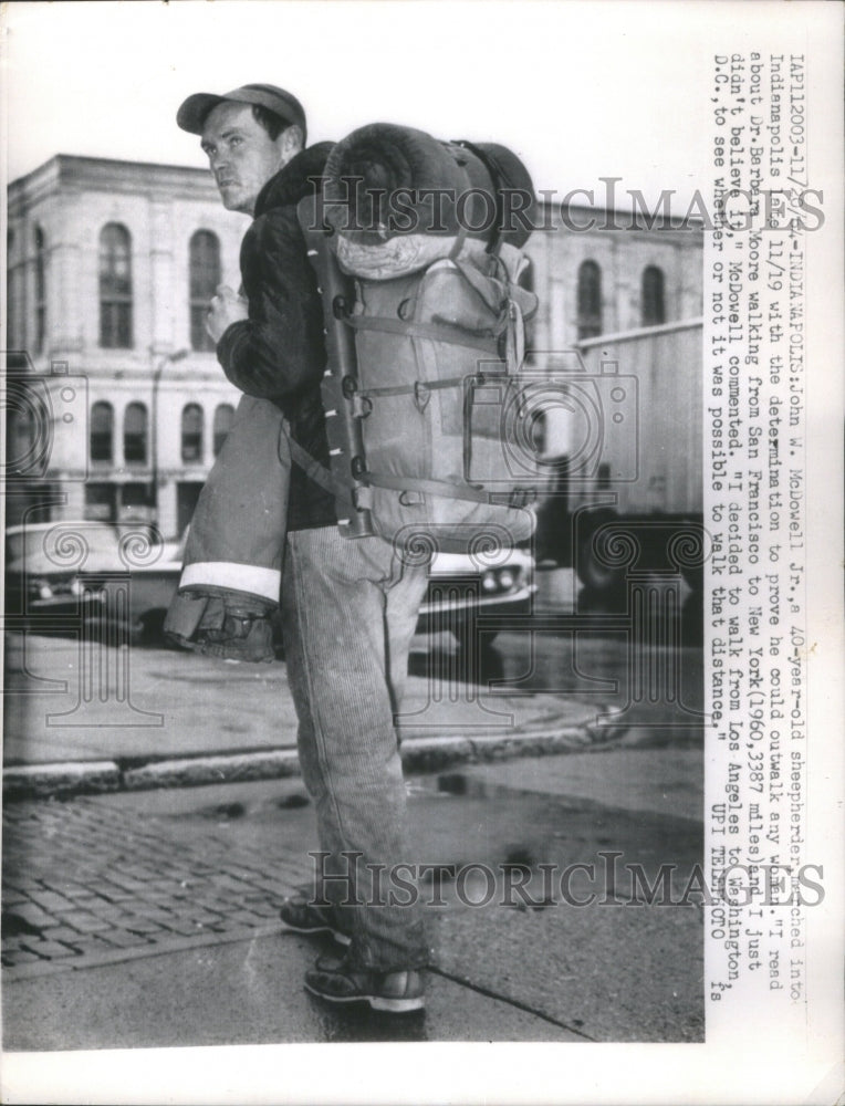 1964 Press Photo John determined to outwalk any woman - Historic Images