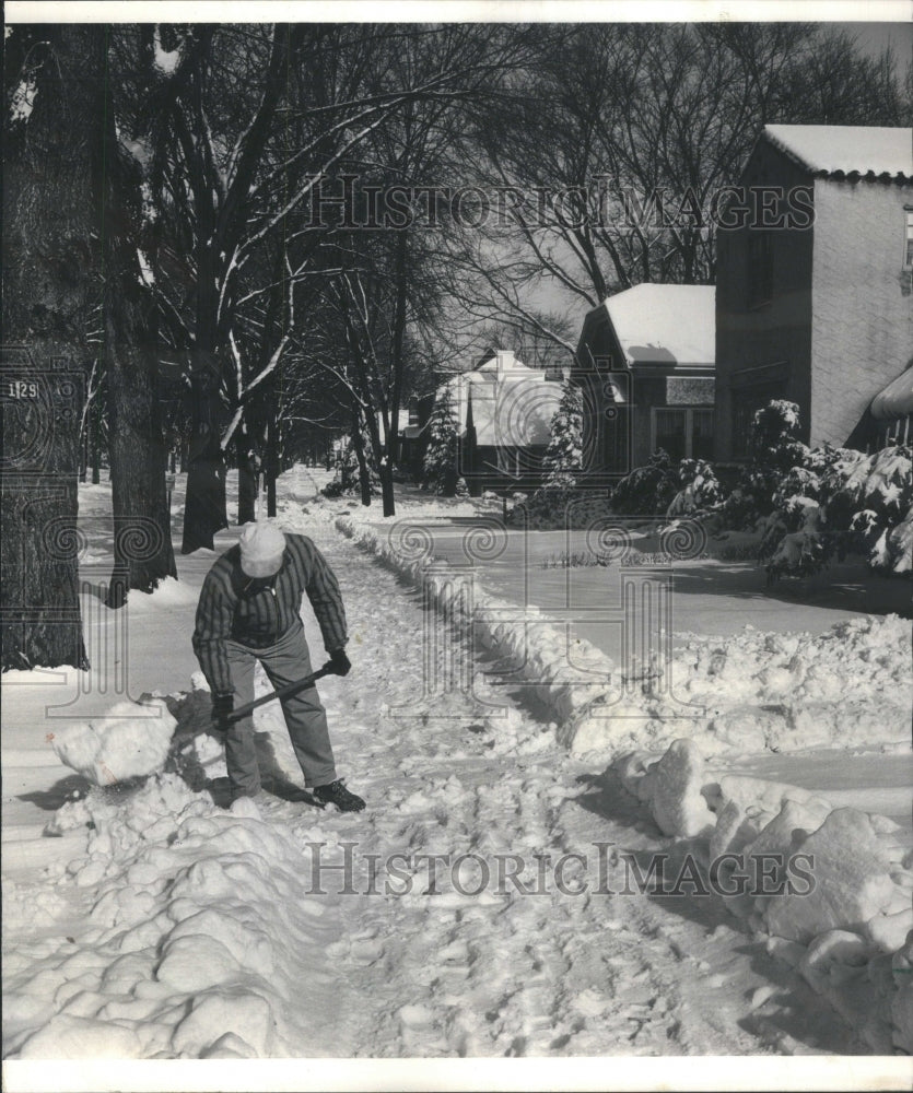 1966 Earl Anderson Digging out snow walk - Historic Images