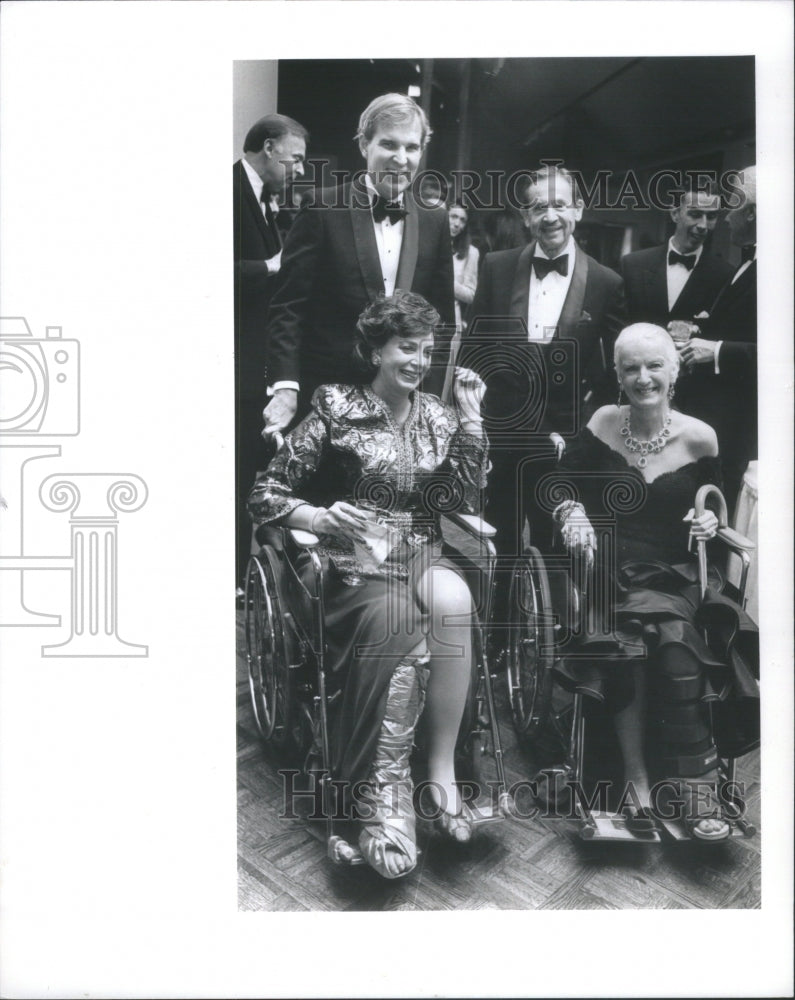 1998 Press Photo Two Lady Parto-goers in Wheelchairs - RRU73987 - Historic Images