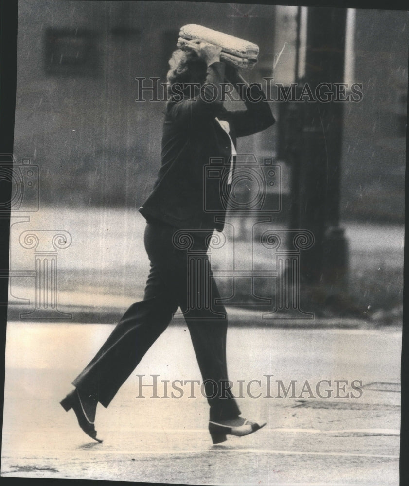 1973 Pedestrian Uses Purse Rainstorm-Historic Images