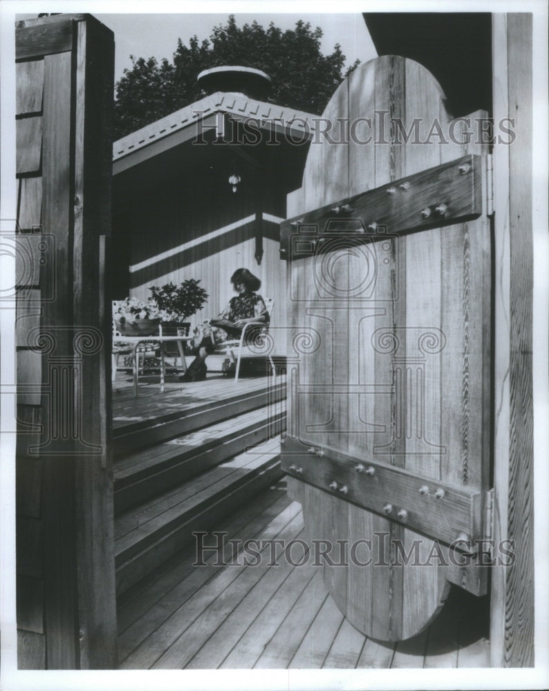 1981, Picture Porches Lady Reading Book - RRU77449 - Historic Images