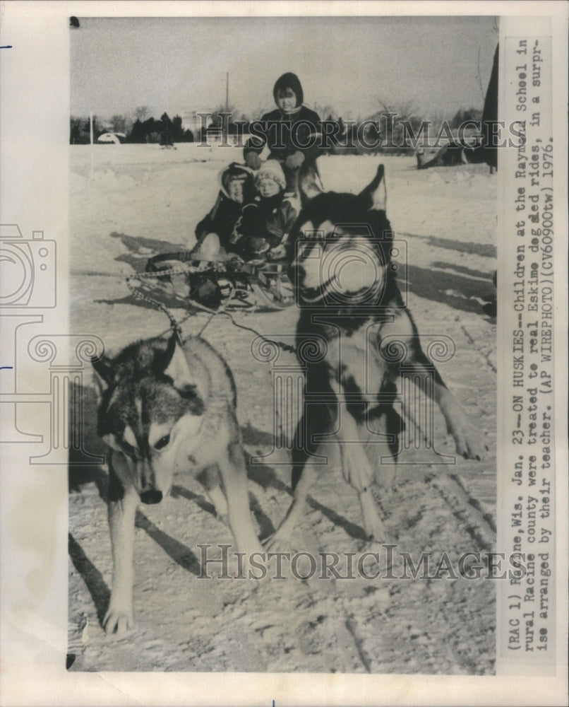 1976, On Huskies Raymond School Children - RRU78961 - Historic Images