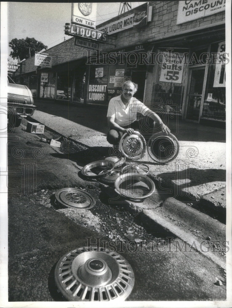 1978 A pothole on the road causing damages.-Historic Images