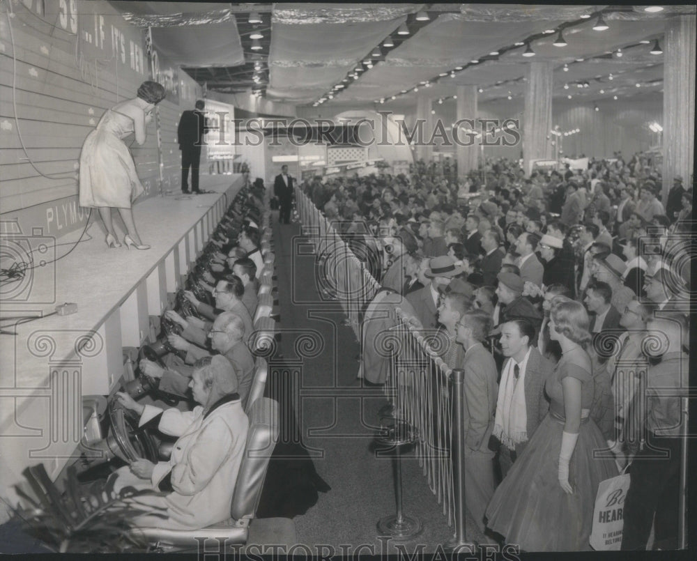 1959, Crowd watching safe driving test - RRU83297 - Historic Images