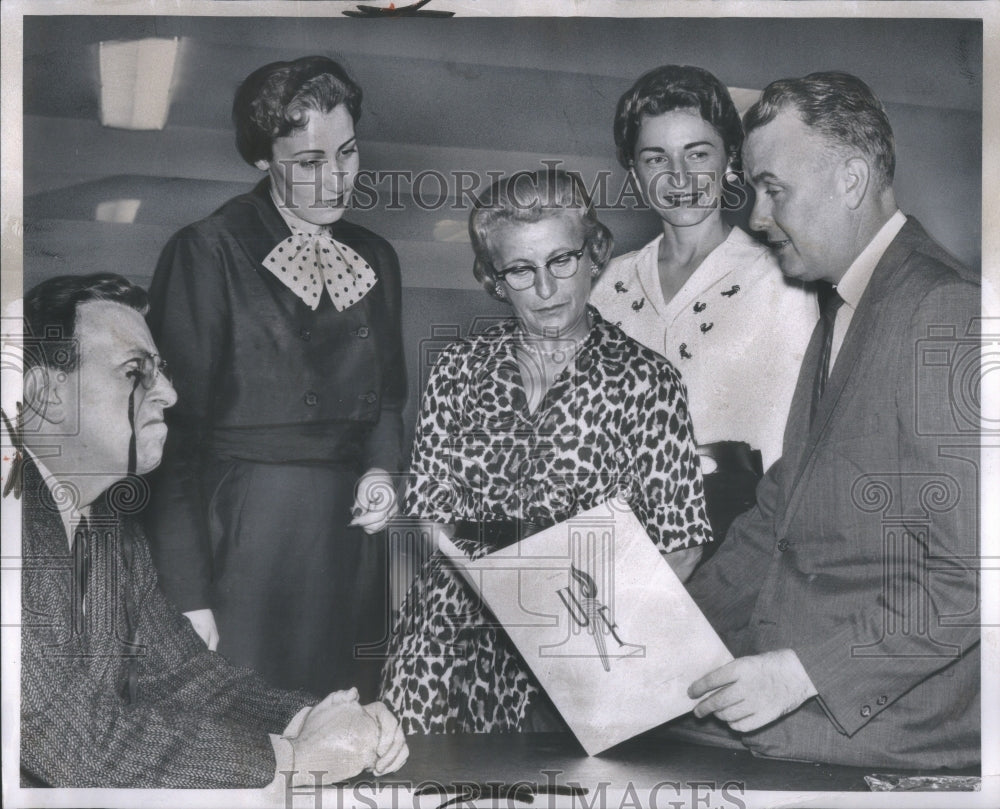 1960 Group looking at UF folder - Historic Images