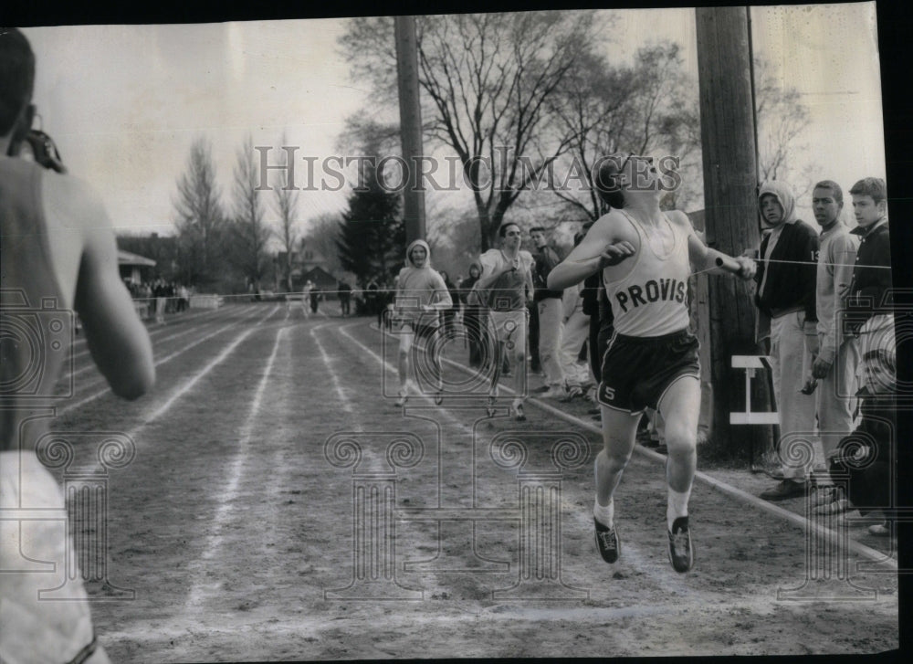 1958, cameraman records runner Oak Park - RRU87689 - Historic Images