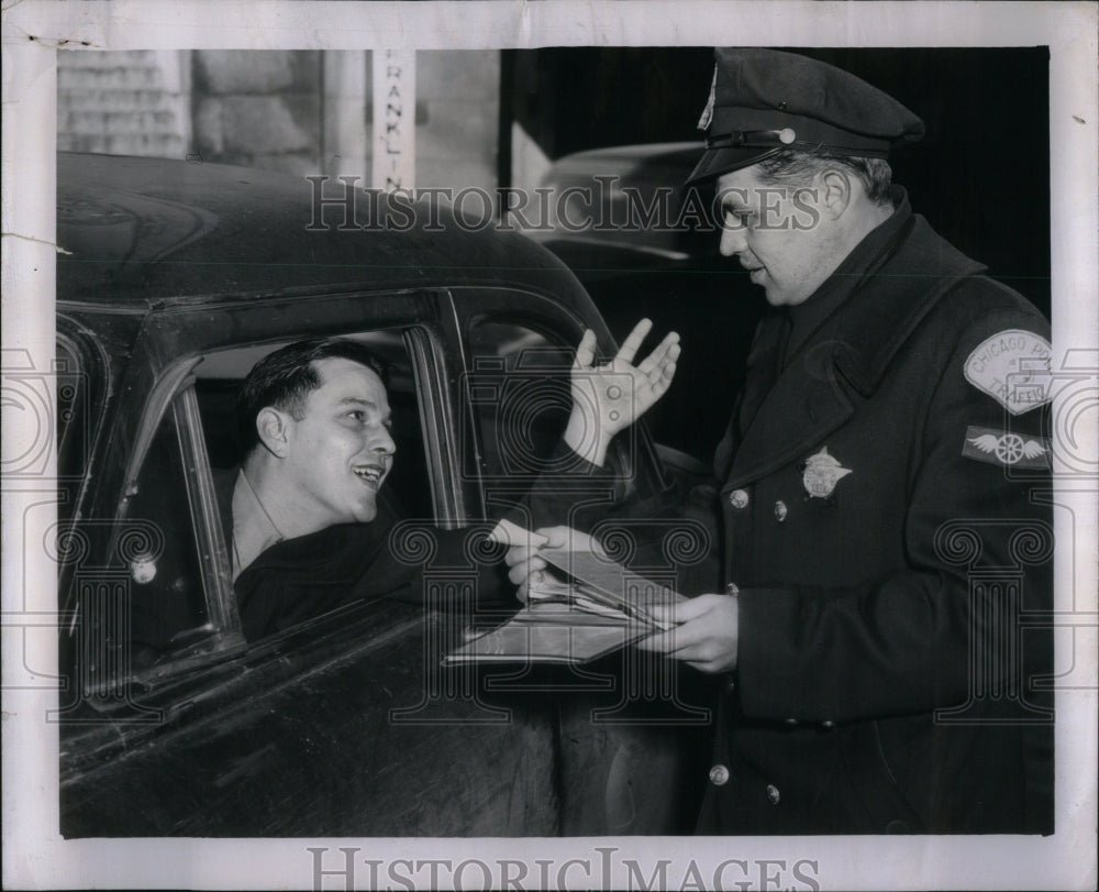 1955 Police Officer Gives Ticket To Citizen - Historic Images