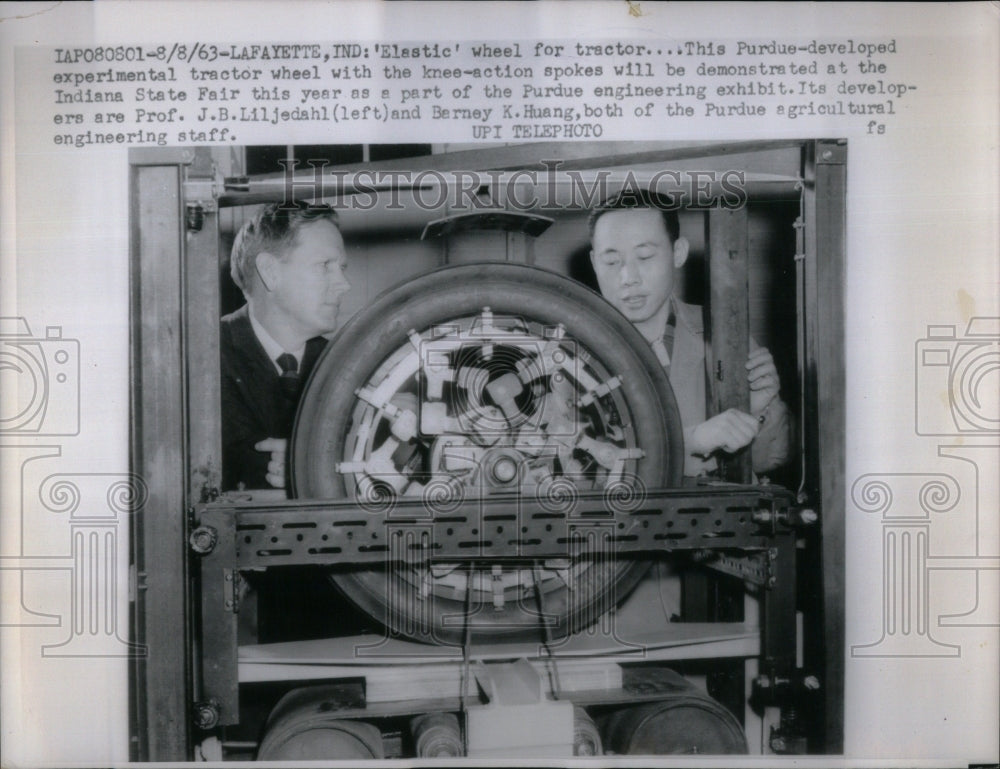 1963 Photo Purdue Engineer Makes Elastic Tractor Wheel - RRU87807 - Historic Images