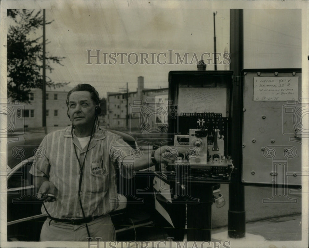 1957 Joseph Sailor checks traffic light-Historic Images