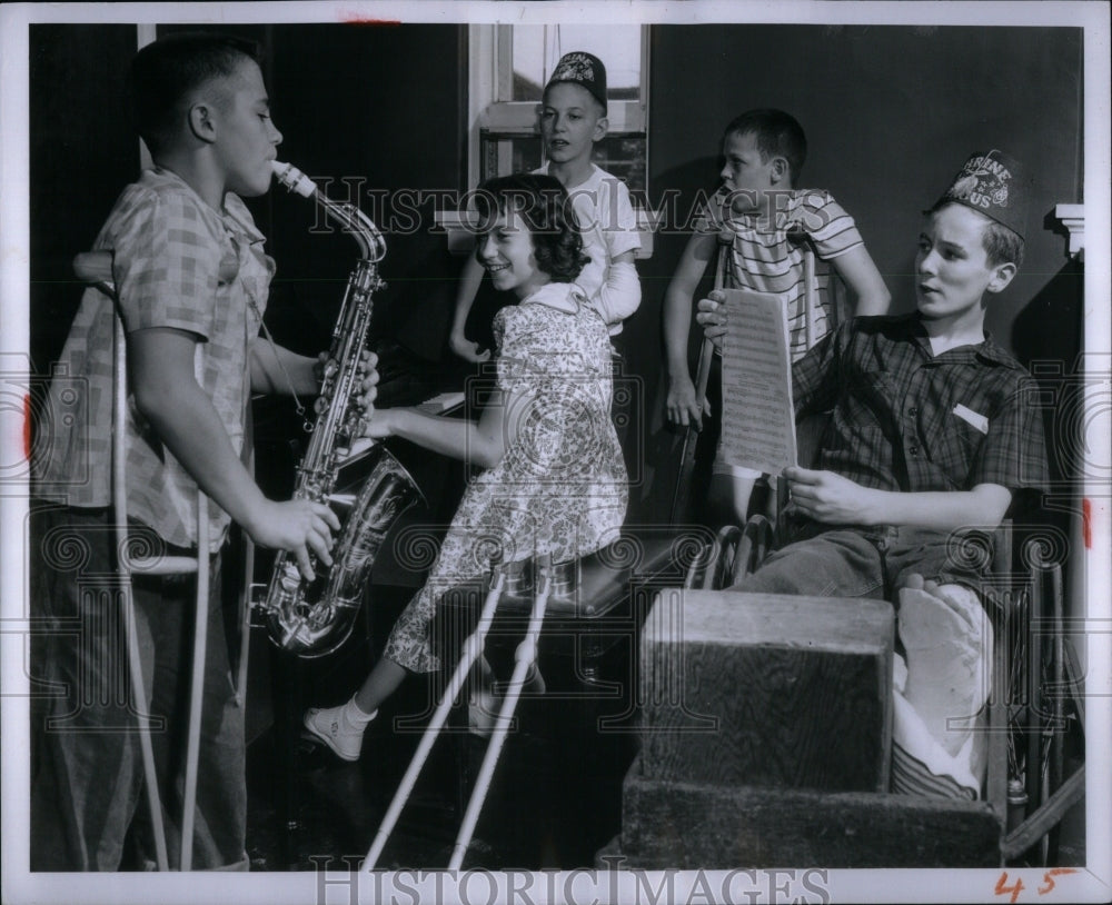 1956 Children play instrument, Shrine Hosp.-Historic Images