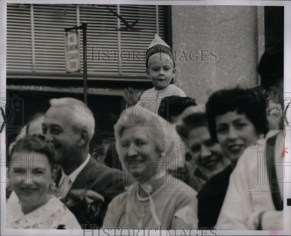 1960 J. Harrington watches VFW Parade - Historic Images