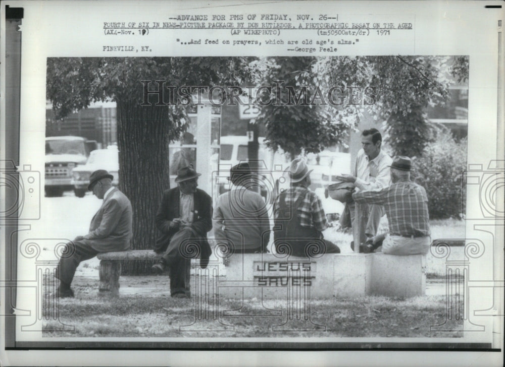 1979 Old people sitting at park - Historic Images