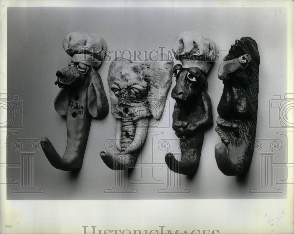 1982, Fiberglas Animal Hooks Dog Elephant - RRU94809 - Historic Images