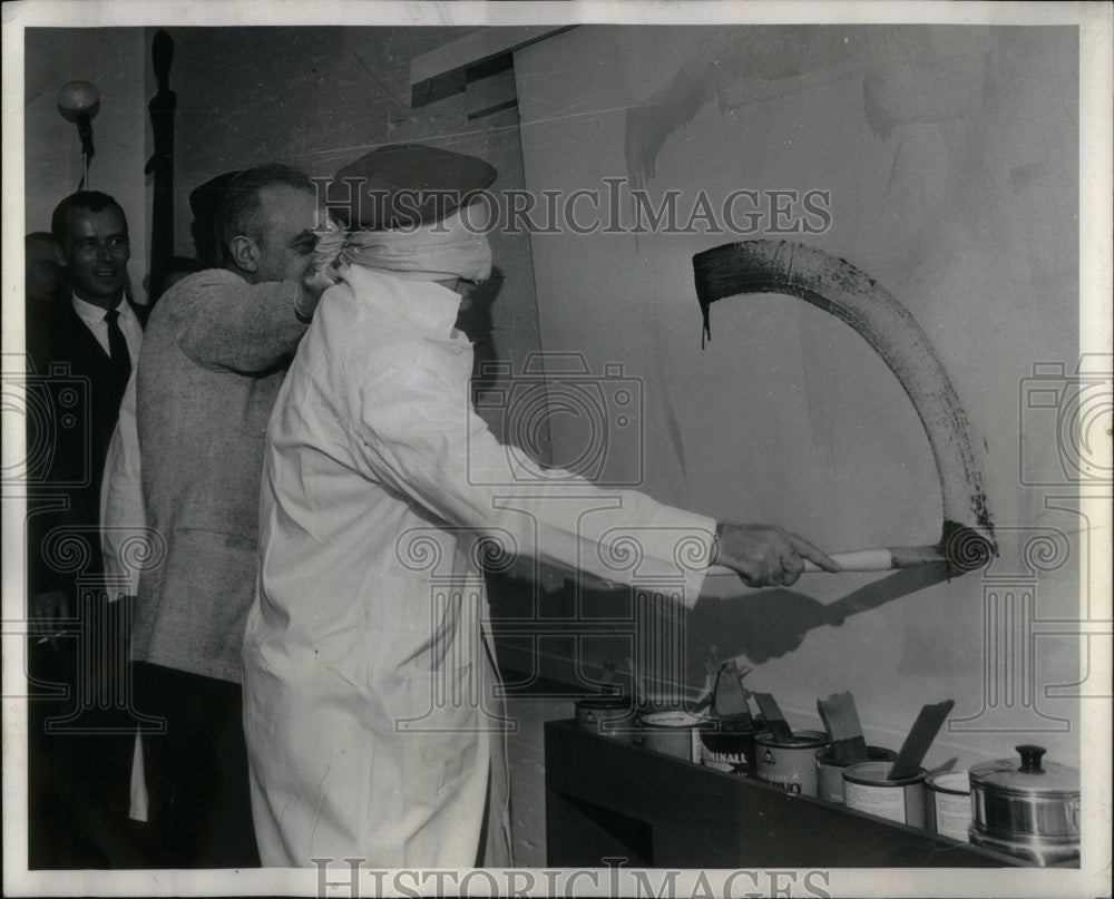 1961 Press Photo Swipe Blue Party Guests Mad Creative - RRU95183 - Historic Images