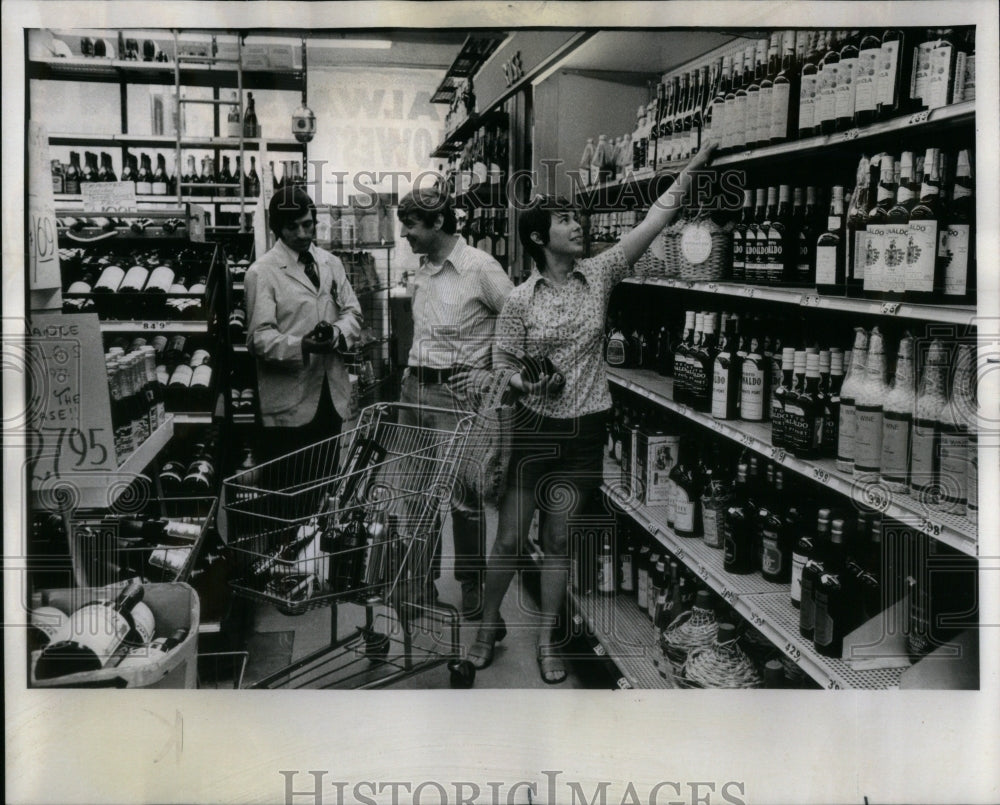 1975, Liquor Store Watch Bill Mauren Poole - RRU97561 - Historic Images