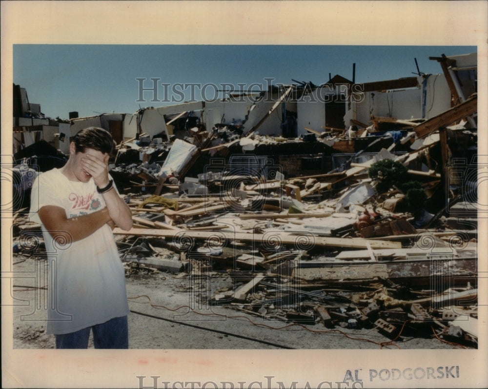 1990 Ken West Searches For Tornado Victim - Historic Images