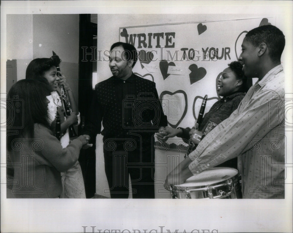 1989 Photo Teachers Giving Awards At Gompers Elem. Sch.-Historic Images