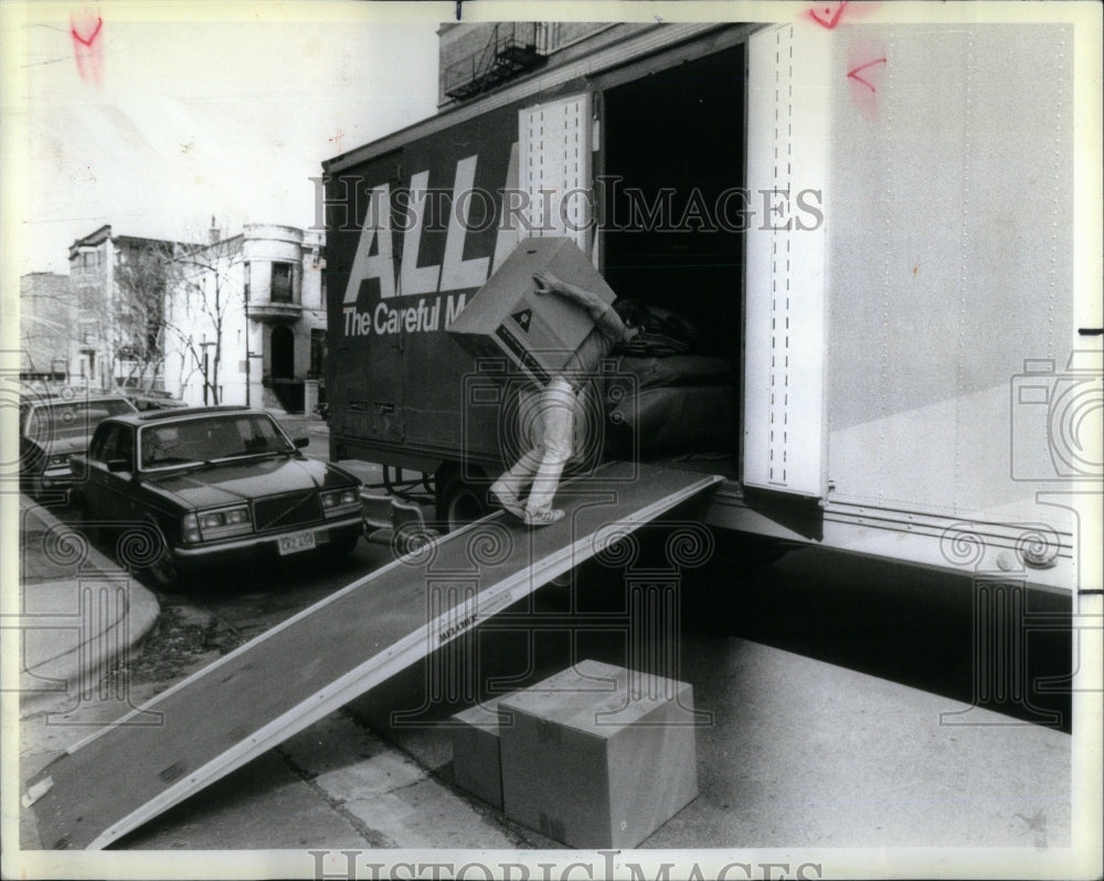 1984  Allied Van worker Frank Johnson Wells-Historic Images