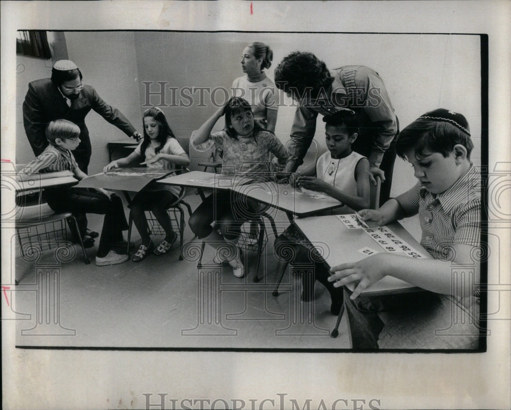 1971 Teachers help disabled children  - Historic Images