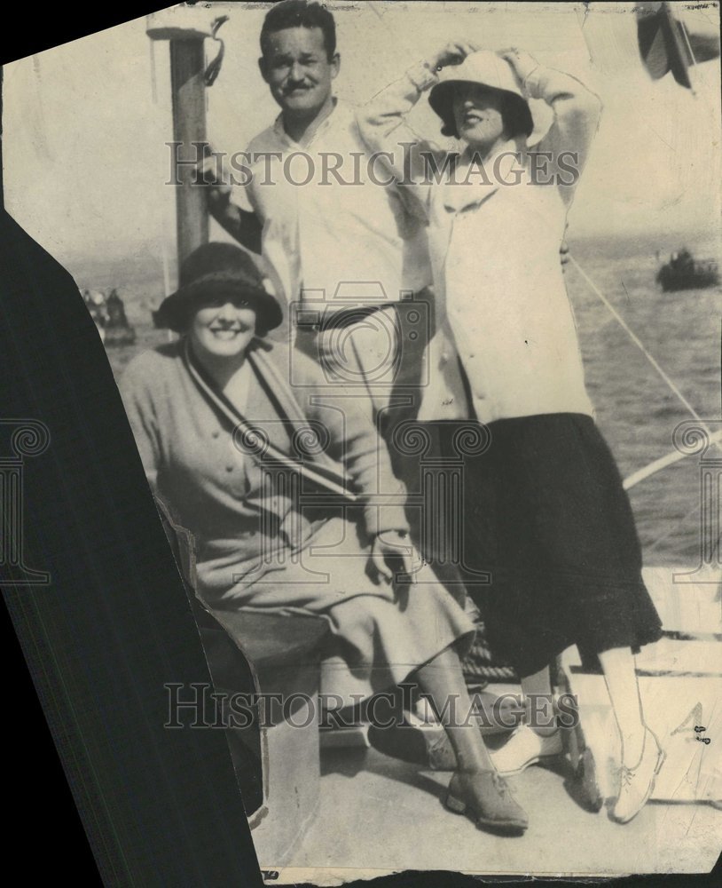Press Photo Three Person One Lady Setting Hats Hot - RRV00097 - Historic Images