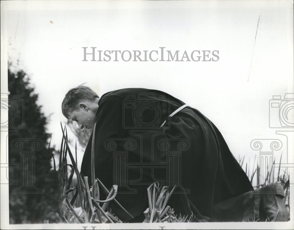 1938 Father Held in Duns Scotus&#39; garden - Historic Images