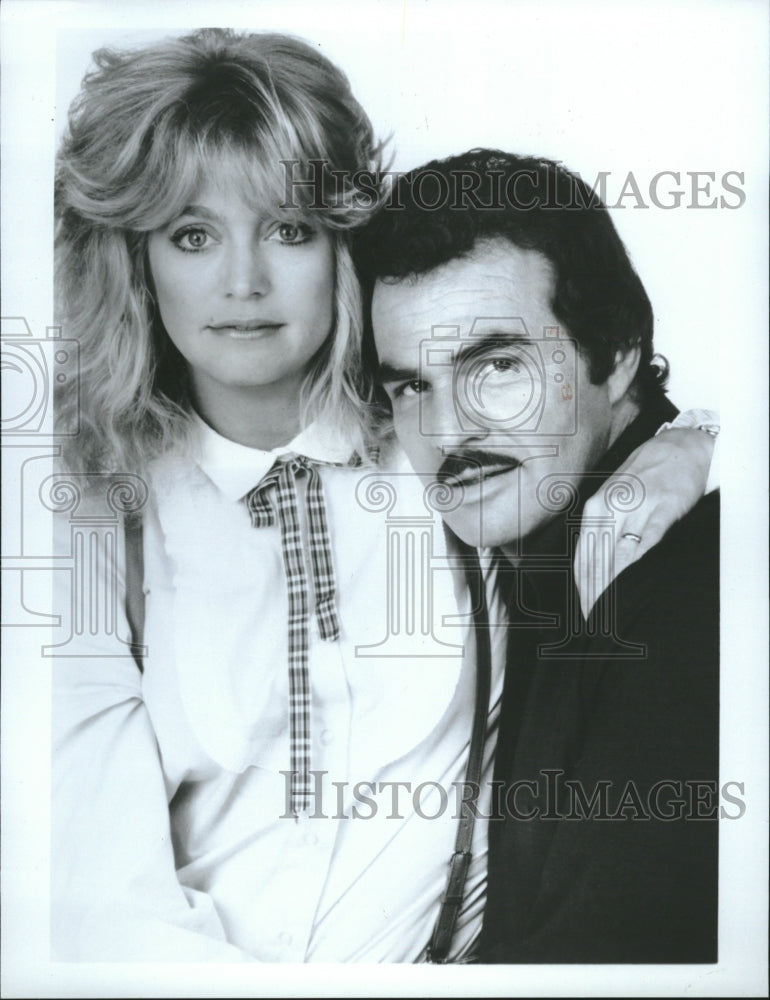 1986, Goldie Hawn and Burt Reynolds - RRV11123 - Historic Images