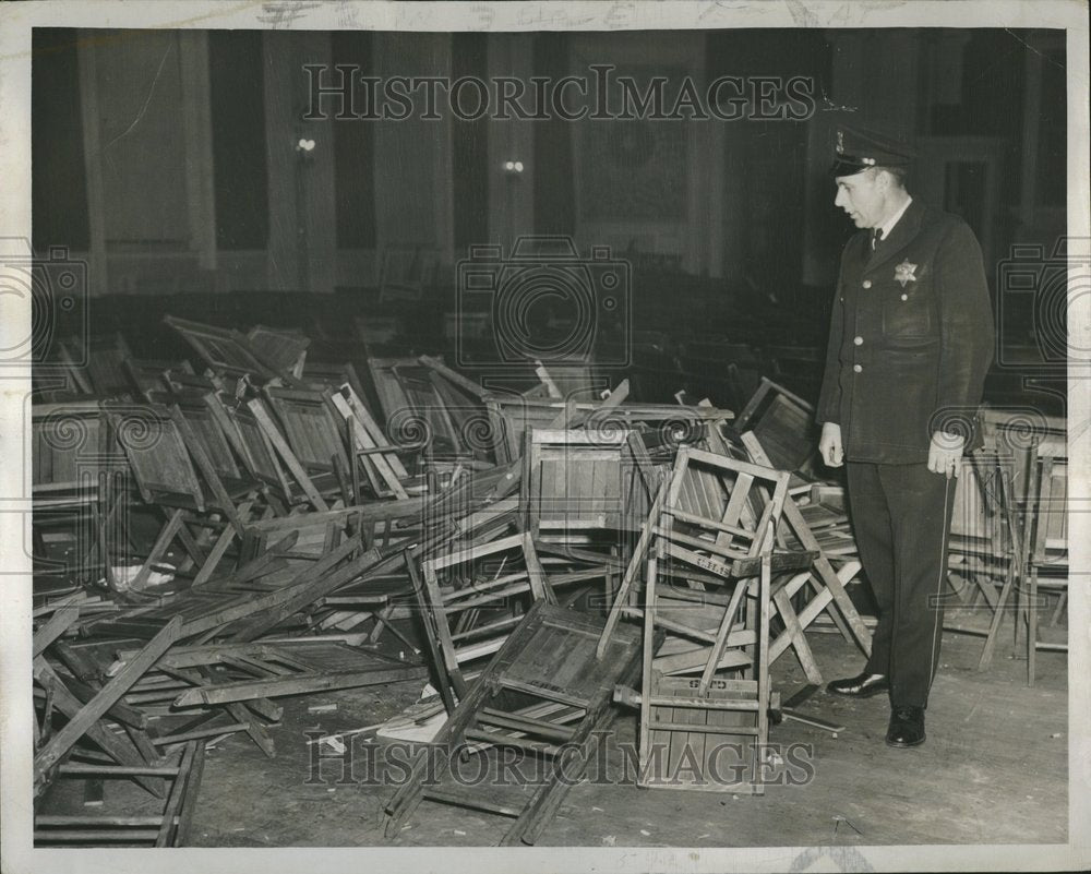 1946, Officer John Cashman Looks Smash Chair - RRV24425 - Historic Images